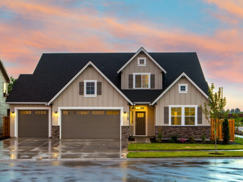 Charming family home in Boise, ID with a modern facade and spacious garage.